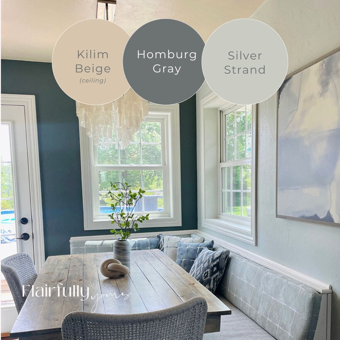 Coastal kitchen nook with Silver Strand walls, Homburg Gray accent, Kilim Beige ceiling, rustic wood table, and modern chandelier