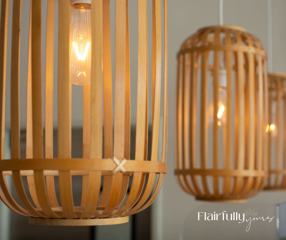 Bamboo coastal pendant lighting with warm bulb glow, adding texture and casual style to coastal spaces.