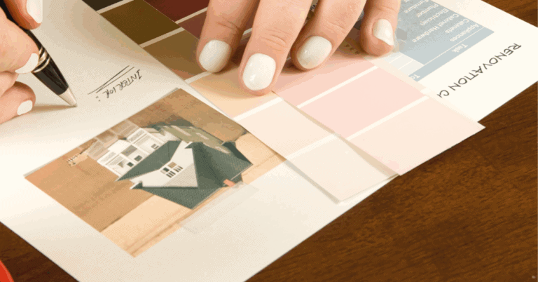 Designer workspace with home floor plans, paint colors, and fabric samples used to plan interior finishes — a realistic home renovation checklist in action.
