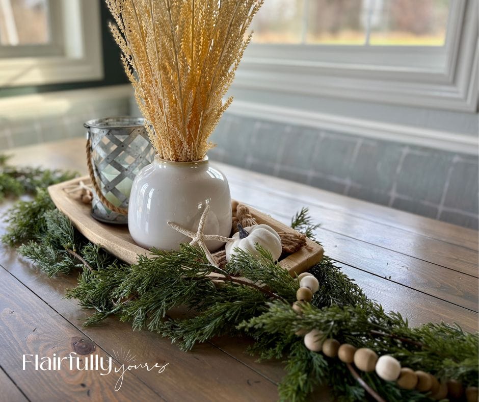 Cedar greenery garland spread across a wood table, ready to use as a natural Thanksgiving centerpiece.