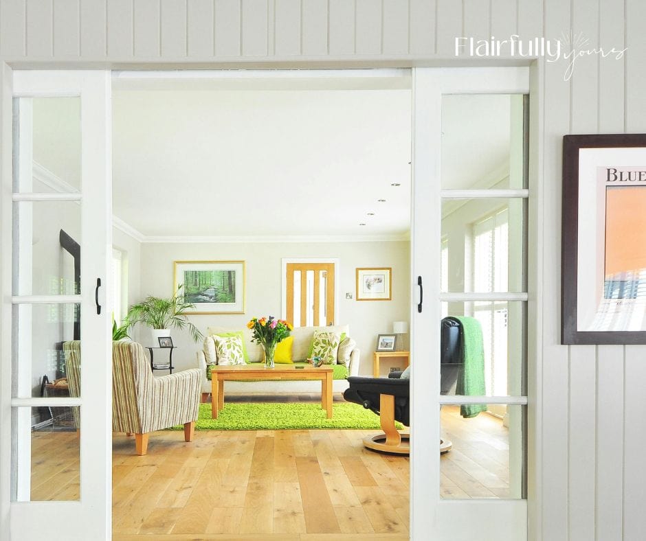 Spring living room with green accents and neutral tones.