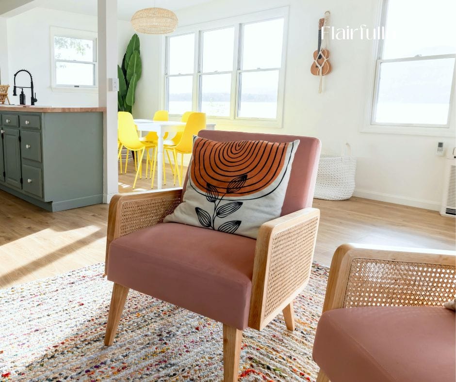A cozy living space with a mauve armchair and bright yellow dining chairs, showcasing a playful spring vibe with colorful accents.