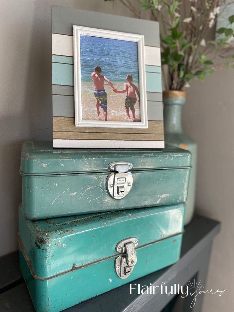 Vintage tackle boxes with simple, timeless design, perfect for coastal decor.