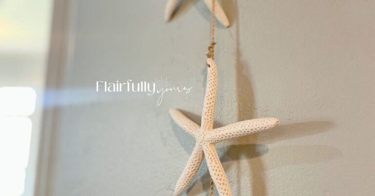 "Coastal Sea Salt wall with hanging white starfish accent, showing soft coastal textures and colors."