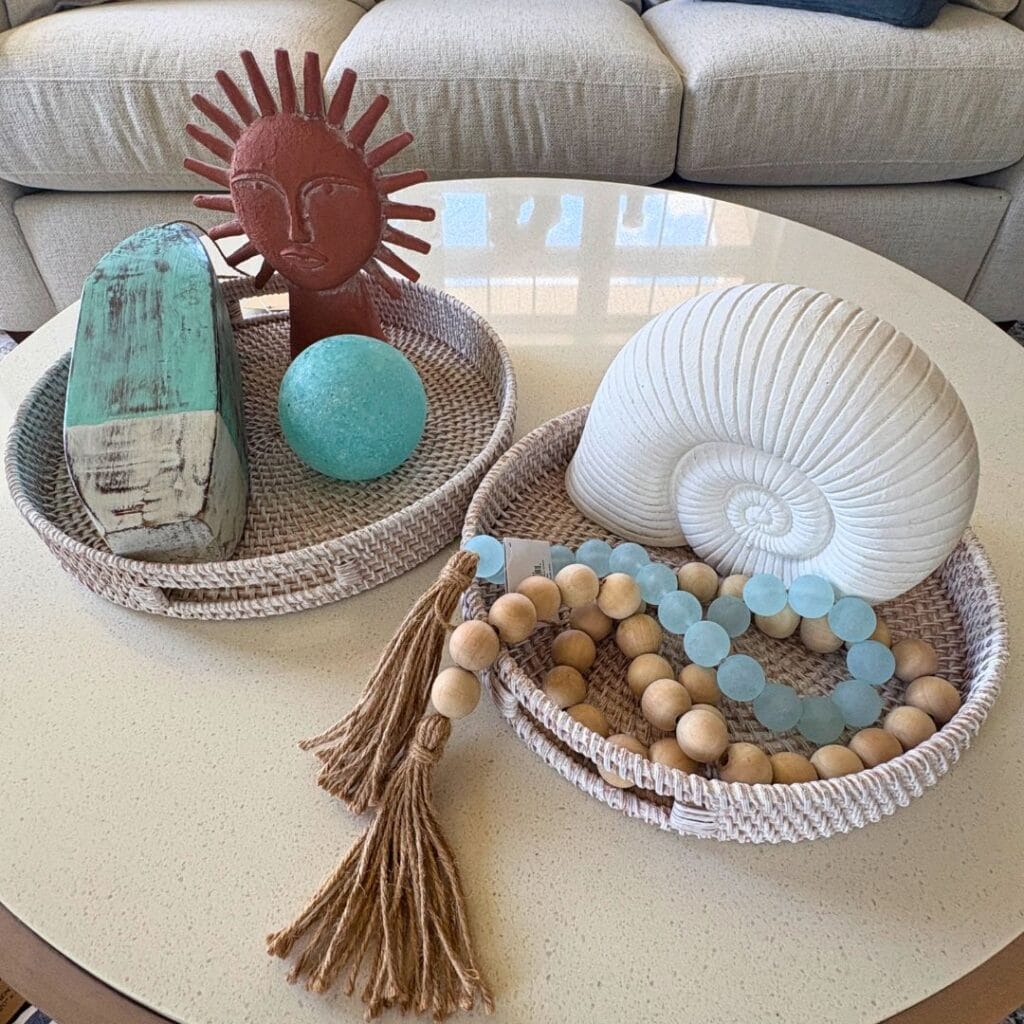 Two coordinated coastal and lake house decor vignettes showing how a cohesive color palette creates a beautifully pulled-together home.