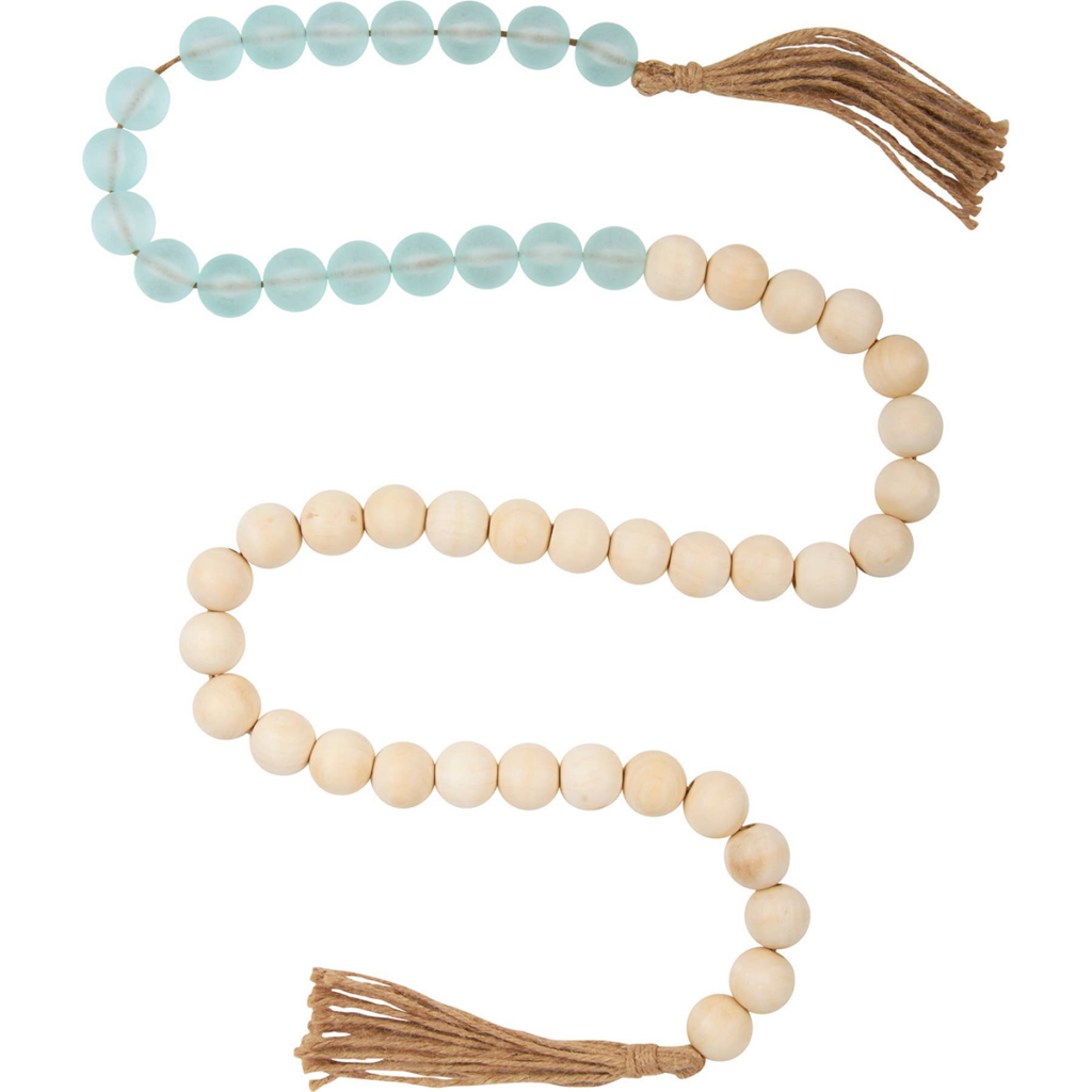 Wood and aqua sea glass bead garland for coastal console table styling